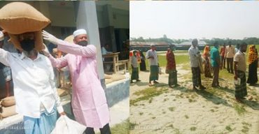 বাউফলে ইলিশ প্রজনন রক্ষায় জেলেদের মাঝে চাল বিতরন