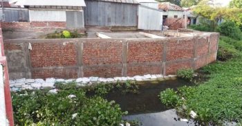 শরীয়তপুরে সরকারি খাল ও অন্যের জমি দখল করে দোকানঘর নির্মান