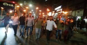 বিএনপি নেতা ইশরাকের বিরুদ্ধে মামলার প্রতিবাদে মশাল মিছিল
