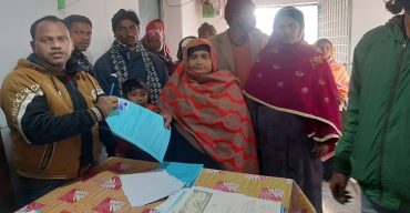 নওগাঁর আত্রাই উপজেলায় ভূমিহীনদের মাঝে ঘরের দলিল বিতরণ