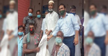 নওগাঁর আত্রাইয়ে ঈদুল আজহা উপলক্ষে ভিজিএফের চাল বিতরণ